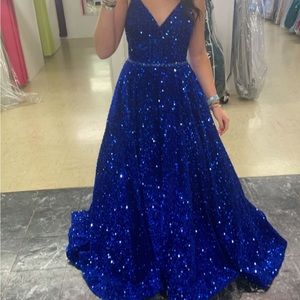This is a beautiful pageant or prom dress. It sparkles non stop and fits great